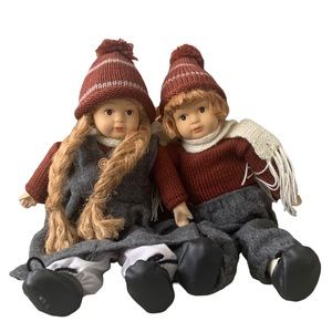 Porcelain dolls in ski outfits vintage